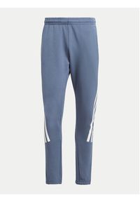 Adidas - adidas Spodnie dresowe Future Icons 3-Stripes IR9194 Niebieski Slim Fit. Kolor: niebieski. Materiał: bawełna #4