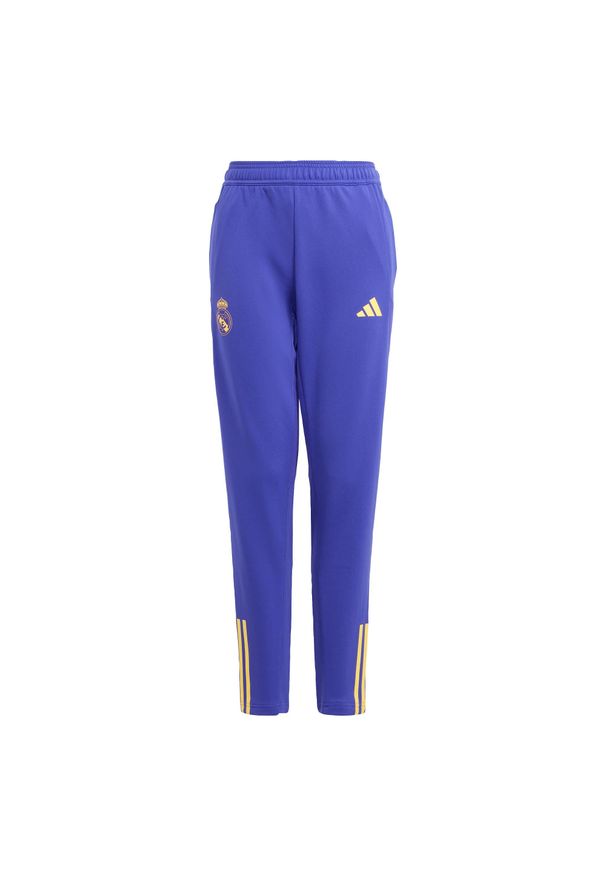 Adidas - Spodnie Real Madrid Tiro 23 Training Kids. Kolor: czarny, fioletowy, wielokolorowy. Materiał: materiał. Sport: piłka nożna
