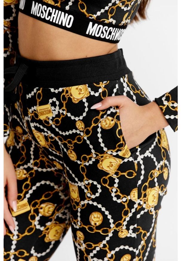 MOSCHINO Damskie spodnie dresowe w złote łańcuchy, Rozmiar XS. Kolor: czarny. Materiał: dresówka
