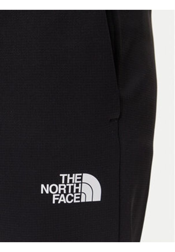 The North Face Spodnie dresowe Reaxion 2.0 NF0A8DRS Czarny Regular Fit. Kolor: czarny. Materiał: syntetyk