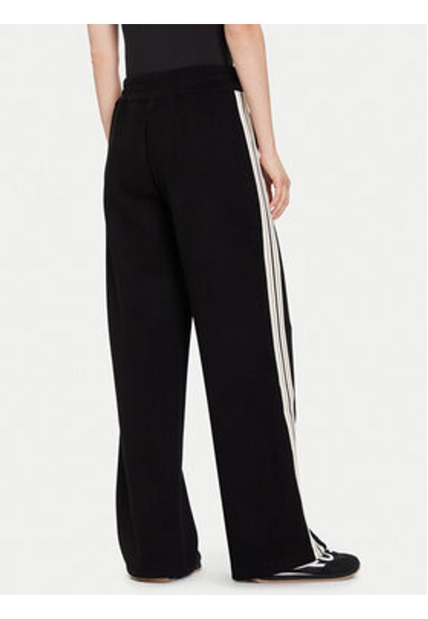 Guess Spodnie palazzo V5BB16 KCX52 Czarny Wide Leg. Kolor: czarny. Materiał: syntetyk