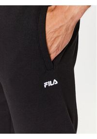 Fila Spodnie dresowe FAM0342 Czarny Regular Fit. Kolor: czarny. Materiał: bawełna