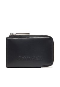 Calvin Klein Portfel damski Embossed Logo Zip Cardholder K60K613157 Czarny. Kolor: czarny. Materiał: skóra