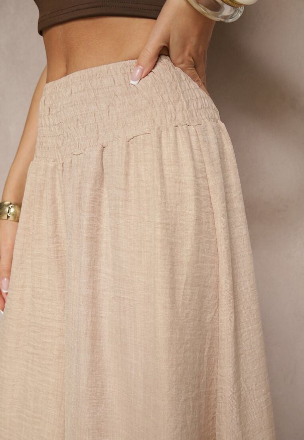Renee - Beżowe Szerokie Spodnie High Waist z Szeroką Gumą w Pasie Korissele. Okazja: na co dzień. Stan: podwyższony. Kolor: beżowy. Materiał: guma. Wzór: aplikacja. Styl: elegancki, casual