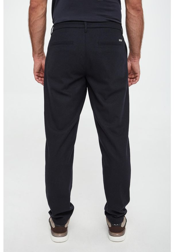 Armani Exchange - Spodnie męskie wełniane ARMANI EXCHANGE. Materiał: wełna