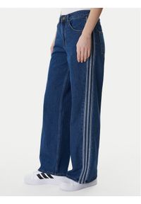 Adidas - adidas Jeansy Firebird KD2935 Niebieski Regular Fit. Kolor: niebieski #1