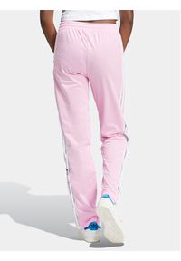 Adidas - adidas Spodnie dresowe Adibreak IP0618 Różowy Regular Fit. Kolor: różowy. Materiał: syntetyk
