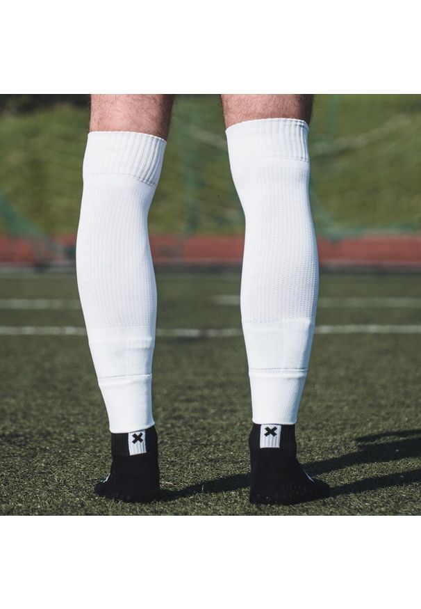 PROSKARY - Getry tuby piłkarskie bez stopy Proskary Junior. Kolor: biały. Sport: piłka nożna