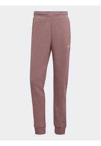 Adidas - adidas Spodnie dresowe adicolor Essentials Trefoil HK0105 Różowy Slim Fit. Kolor: różowy. Materiał: bawełna, dresówka #5