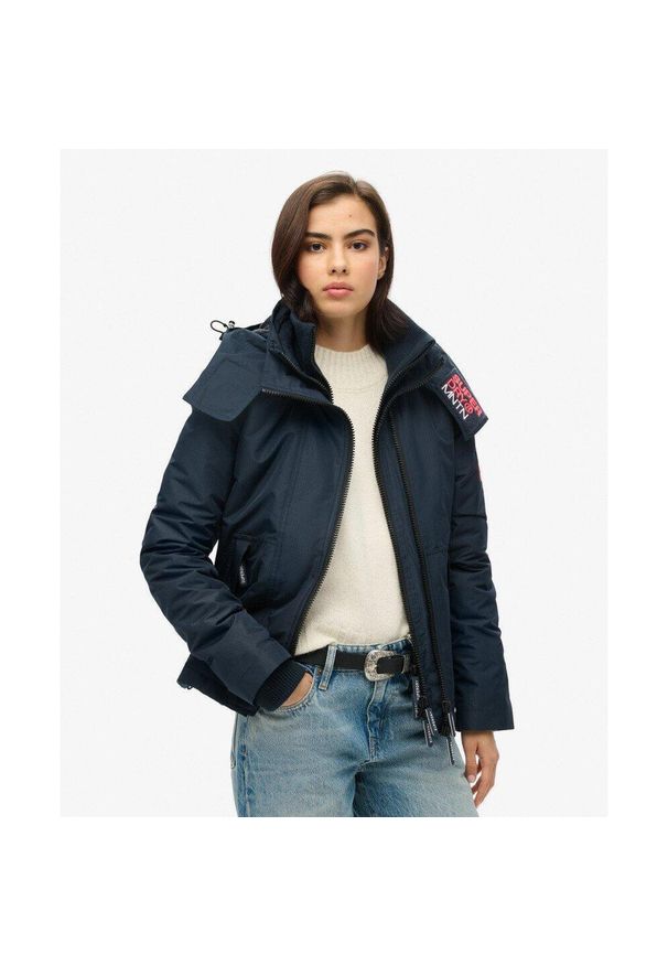 Superdry - Kurtka przeciwwiatrowa z kapturem na góry. Typ kołnierza: kaptur. Kolor: niebieski. Długość rękawa: długi rękaw