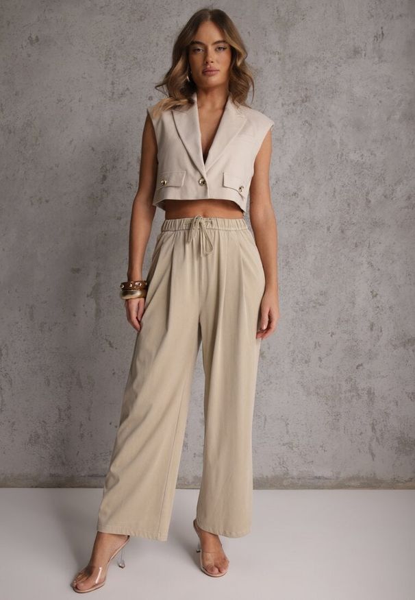 Renee - Beżowe Szerokie Spodnie Wiskozą Bawełną i Elastyczną Talią ze Sznurkiem Arkinae. Okazja: na co dzień. Stan: podwyższony. Kolor: beżowy. Materiał: wiskoza, bawełna. Wzór: aplikacja. Styl: casual