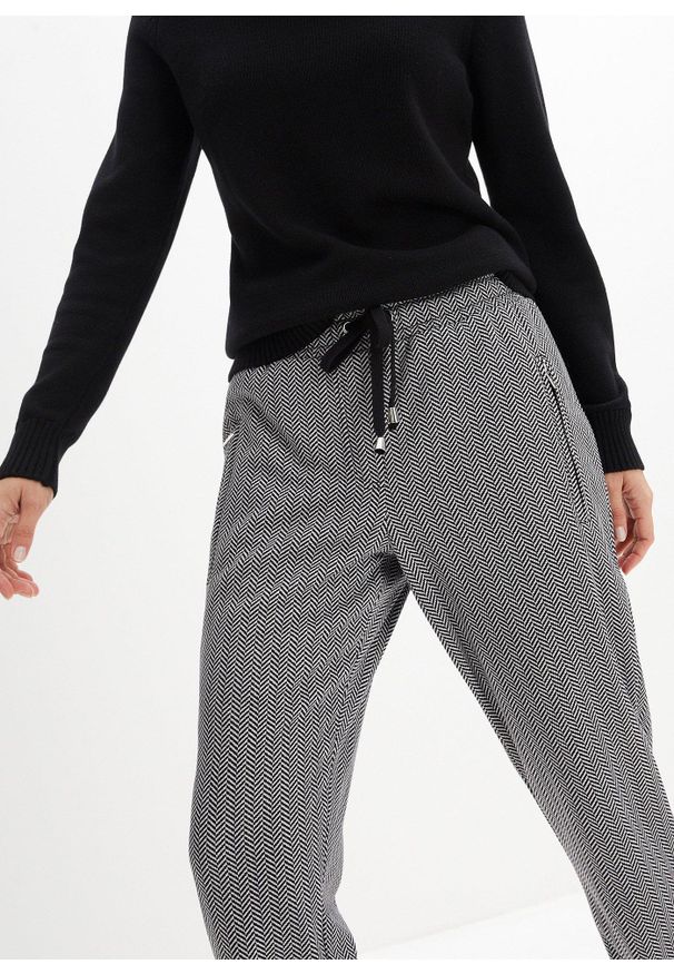 bonprix - Spodnie termiczne z gumką w talii. Kolor: biały