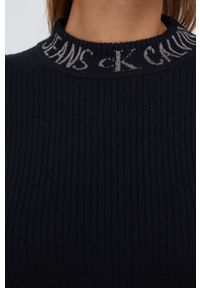 Calvin Klein Jeans - Sukienka z domieszką wełny. Kolor: czarny. Materiał: wełna. Długość rękawa: długi rękaw. Typ sukienki: dopasowane. Długość: mini #6