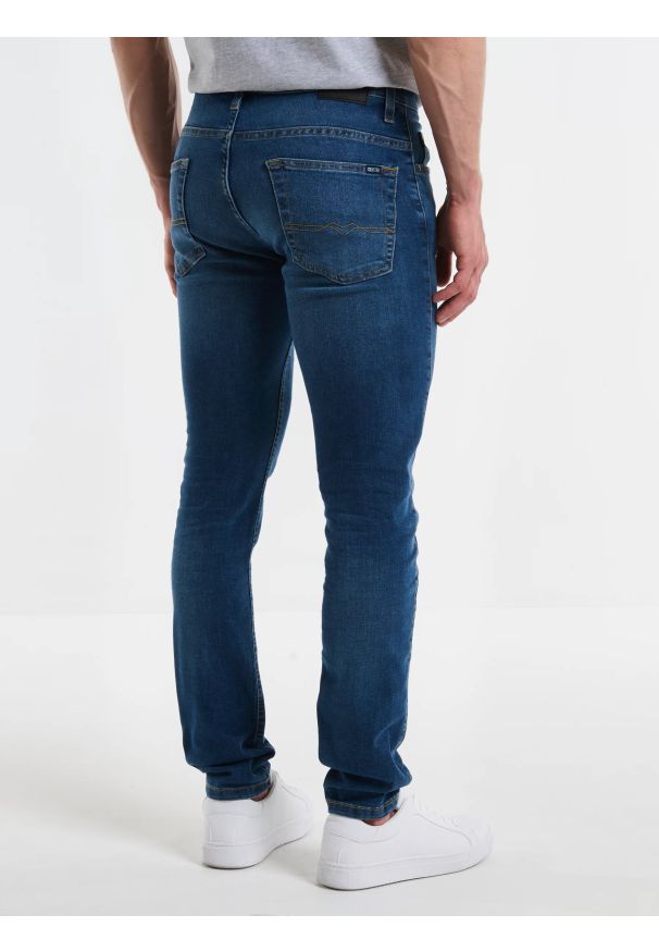 Big-Star - Jeansy męskie skinny niebieskie Deric 303. Okazja: na co dzień. Stan: obniżony. Kolor: niebieski. Styl: elegancki, casual