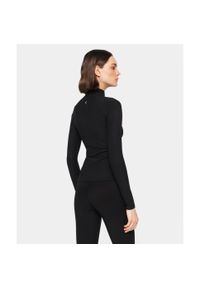 Longsleeve Carpatree prążkowany z kieszenią Onyx Flow czarny. Kolor: czarny. Materiał: prążkowany. Długość rękawa: długi rękaw. Sport: joga i pilates