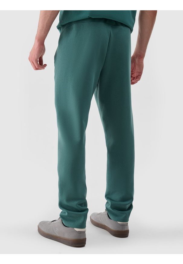 4f - 4F Spodnie dresowe męskie - zielone XL. Kolor: zielony. Materiał: dresówka. Wzór: gładki, ze splotem. Sport: fitness