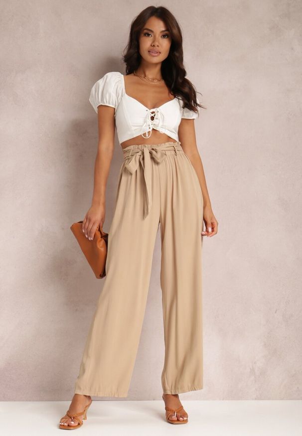 Renee - Beżowe Spodnie Szerokie Phiorephis. Kolor: beżowy. Materiał: tkanina, materiał, wiskoza. Długość: długie. Wzór: gładki, kwiaty