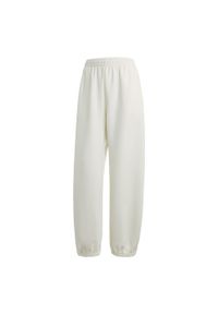 Adidas - Spodnie ALL SZN Soft Lux Loose. Kolor: biały