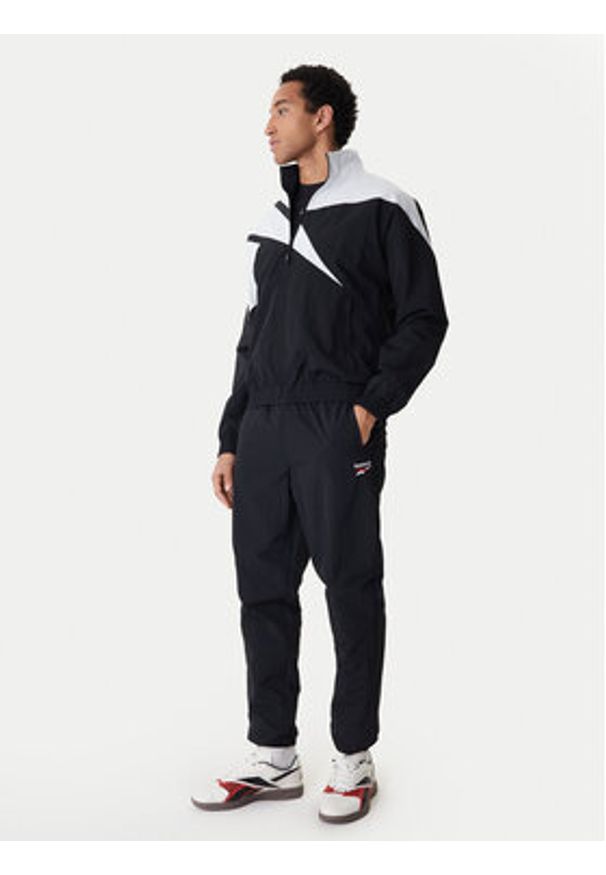 Reebok Spodnie dresowe Barrett RK25552CCM Czarny Regular Fit. Kolor: czarny. Materiał: syntetyk
