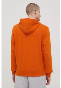 New Balance bluza MT13905VTO męska kolor pomarańczowy z kapturem z nadrukiem. Typ kołnierza: kaptur. Kolor: pomarańczowy. Materiał: dzianina. Wzór: nadruk