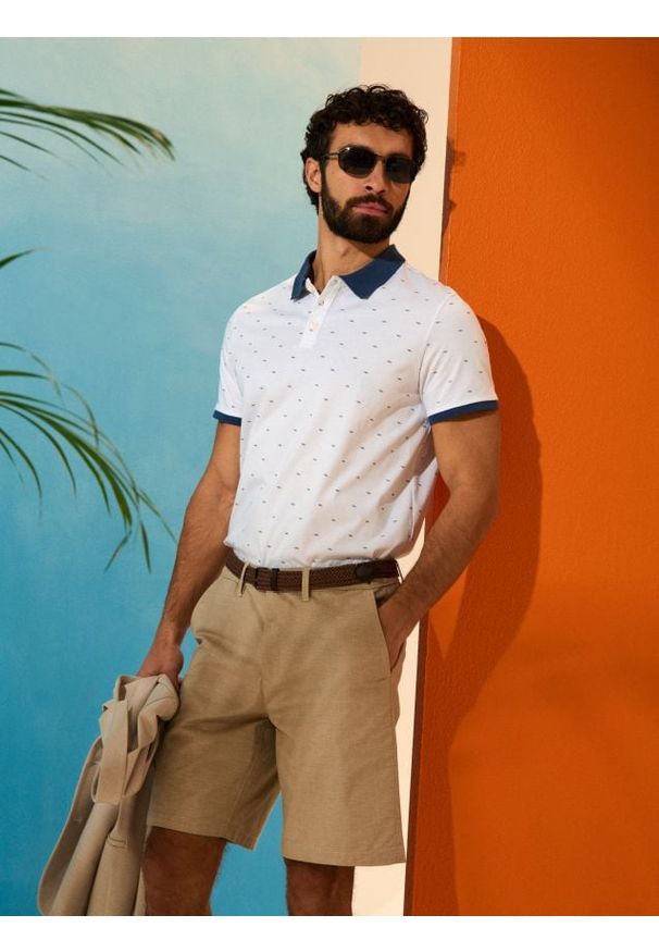 Sinsay - Bawełniana koszulka polo - biały. Typ kołnierza: polo. Kolor: biały. Materiał: bawełna