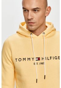 TOMMY HILFIGER - Tommy Hilfiger - Bluza. Okazja: na co dzień. Typ kołnierza: kaptur. Kolor: żółty. Materiał: bawełna. Wzór: aplikacja. Styl: casual #4