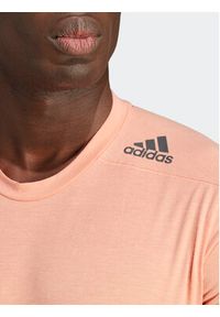 Adidas - adidas Koszulka techniczna Designed for Training IL1443 Pomarańczowy Slim Fit. Kolor: pomarańczowy. Materiał: syntetyk