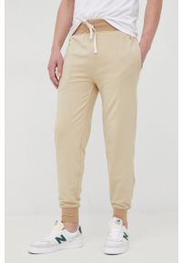 Polo Ralph Lauren spodnie męskie kolor beżowy gładkie. Kolor: beżowy. Materiał: dzianina. Wzór: gładki