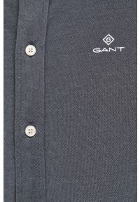 GANT - Gant Koszula męska kolor szary regular z kołnierzykiem button-down. Okazja: na co dzień. Typ kołnierza: button down. Kolor: szary. Materiał: materiał, dzianina, tkanina. Długość rękawa: długi rękaw. Długość: długie. Wzór: gładki. Styl: casual