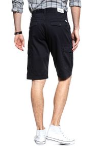 Wrangler - KRÓTKIE SPODENKI WRANGLER CARGO SHORT NAVY WASHED W15DHC49I. Materiał: materiał. Długość: krótkie. Wzór: aplikacja #9