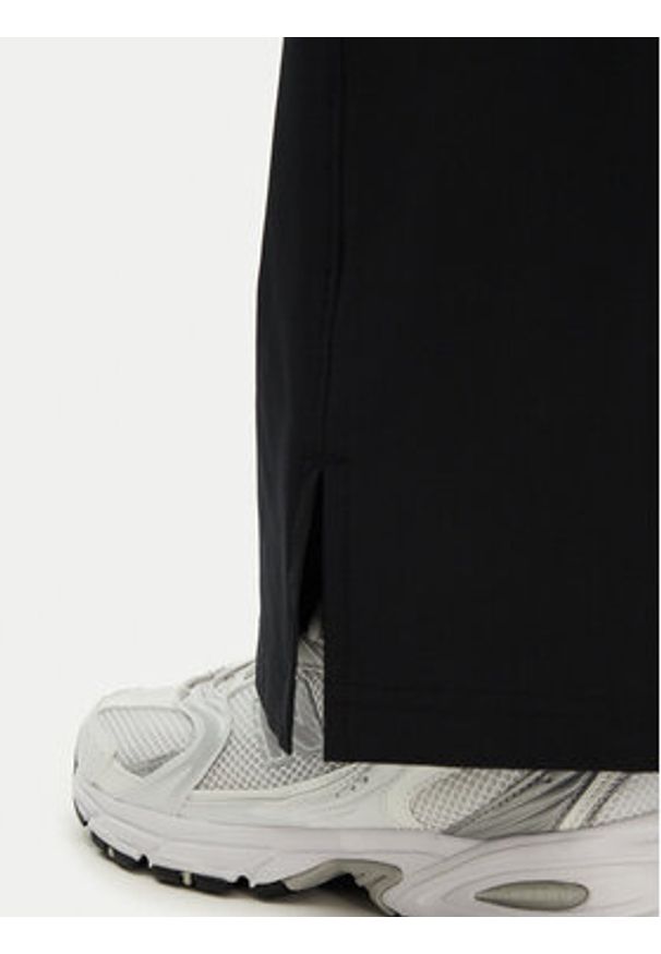 Under Armour Spodnie dresowe Rival 1386453 Czarny Wide Leg. Kolor: czarny. Materiał: syntetyk