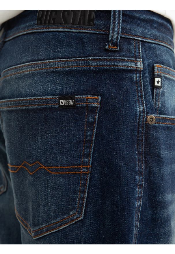 Big-Star - Jeansy chłopięce ze zwężoną nogawką granatowe Noah 523. Kolor: niebieski. Materiał: jeans. Styl: młodzieżowy, sportowy, elegancki