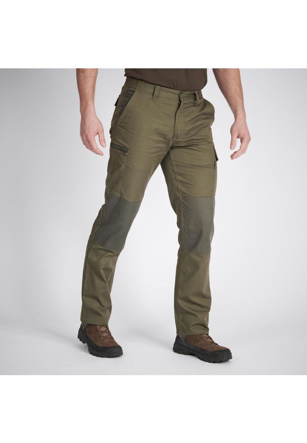 SOLOGNAC - Spodnie myśliwskie Solognac Steppe 300 wytrzymałe. Kolor: brązowy, zielony, wielokolorowy. Materiał: poliester, tkanina, bawełna