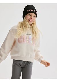 Reserved - Bluza z aplikacją - złamana biel. Materiał: dzianina, bawełna. Wzór: aplikacja