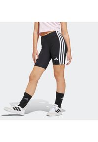 Adidas - Legginsy dziecięce ADIDAS krótkie. Okazja: na uczelnię. Kolor: czarny. Materiał: bawełna, włókno, jersey. Długość: krótkie. Wzór: paski. Styl: sportowy