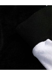 VERSACE - Czarne spodnie dresowe z logowanymi lampasami. Kolor: czarny. Materiał: dresówka #2