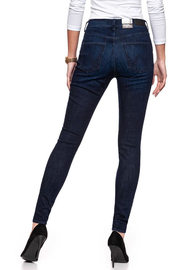 Wrangler - WRANGLER SUPER HIGH SKINNY TAINTED BLUE W27WSZ21H 112128196. Stan: podwyższony. Wzór: jednolity