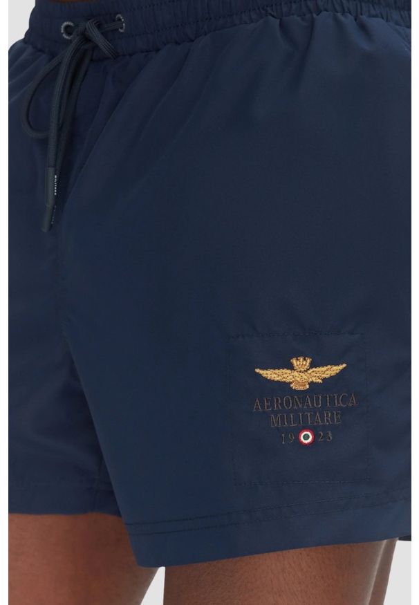 Aeronautica Militare - AERONAUTICA MILITARE Granatowe szorty kąpielowe, Rozmiar 52. Kolor: niebieski. Materiał: materiał