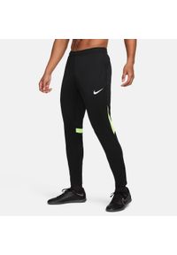 Spodnie sportowe męskie Nike Dri-FIT Academy Pro Pants. Kolor: czarny, żółty, wielokolorowy. Materiał: poliester. Technologia: Dri-Fit (Nike). Sport: piłka nożna