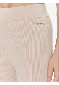 Calvin Klein Spodnie dzianinowe Essential K20K206023 Beżowy Wide Leg. Kolor: beżowy. Materiał: dzianina, syntetyk