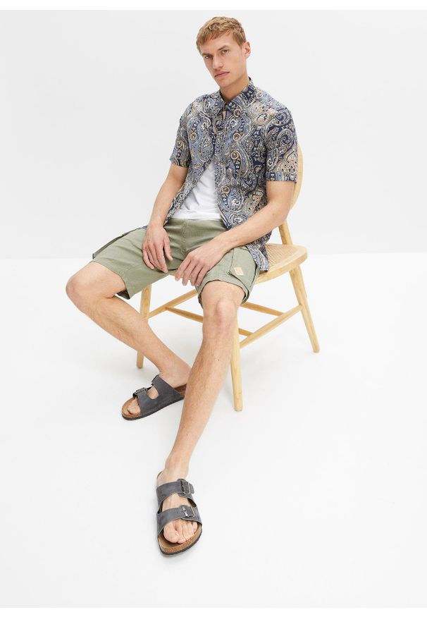 bonprix - Koszula z krótkim rękawem z lekkiego letniego materiału. Kolor: niebieski. Materiał: materiał. Długość rękawa: krótki rękaw. Długość: krótkie. Wzór: paisley. Sezon: lato
