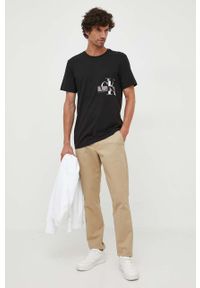 Calvin Klein Jeans t-shirt bawełniany kolor czarny z nadrukiem. Kolor: czarny. Materiał: bawełna. Długość rękawa: krótki rękaw. Długość: krótkie. Wzór: nadruk. Styl: klasyczny