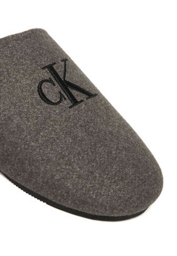 Calvin Klein Kapcie Home Slipper Mule HM0HM01931 Szary. Kolor: szary. Materiał: materiał