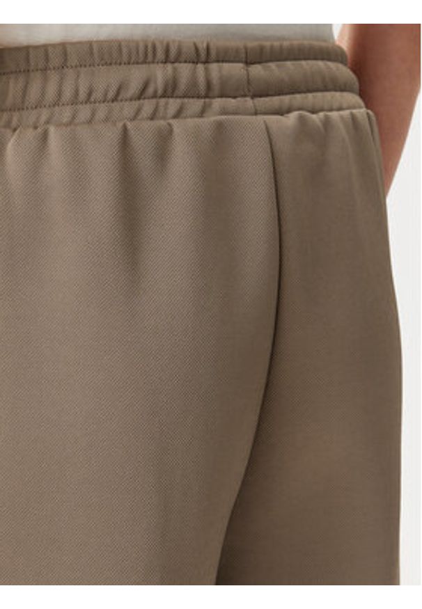 Puma Spodnie dresowe T7 Always On 629797 Brązowy Straight Fit. Kolor: brązowy. Materiał: bawełna