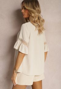 Renee - Beżowa Luźna Bluzka z Ażurową Wstawką na Rękawach Birian. Kolor: beżowy. Materiał: koronka, jeans. Wzór: ażurowy. Sezon: lato. Styl: elegancki