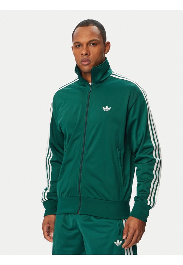 Adidas - adidas Bluza Firebird KD8314 Zielony Loose Fit. Kolor: zielony. Materiał: syntetyk