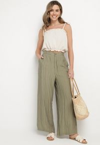 Born2be - Ciemnozielone Szerokie Spodnie z Wysokim Stanem Natalania. Okazja: na co dzień. Stan: podwyższony. Kolor: zielony. Materiał: len. Styl: casual, elegancki