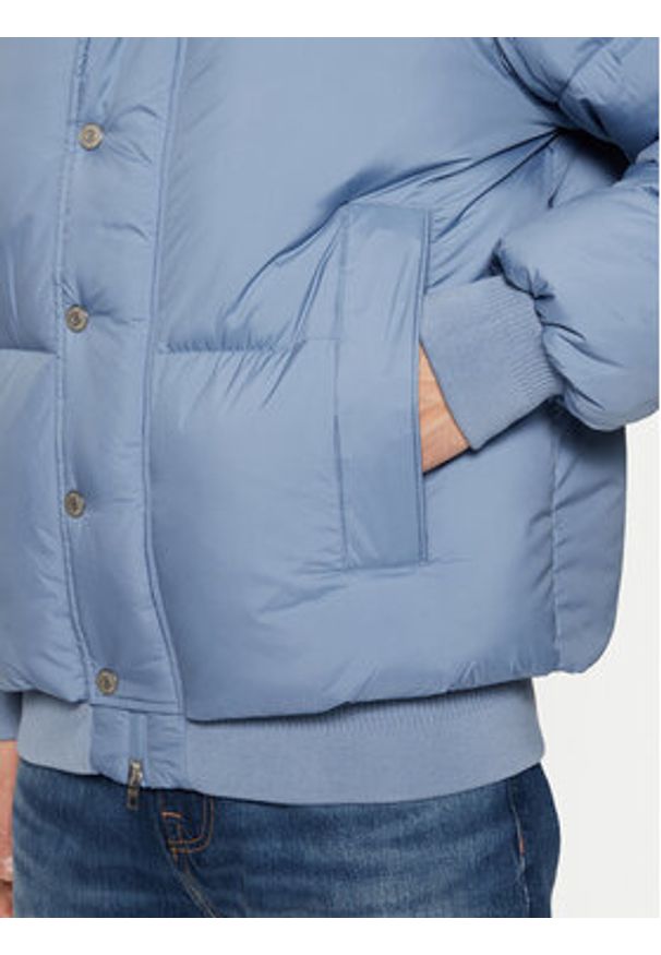 Tommy Jeans Kurtka puchowa DM0DM21145 Niebieski Regular Fit. Kolor: niebieski. Materiał: syntetyk