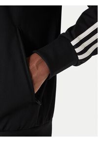 Adidas - adidas Bluza Firebird KD8312 Czarny Loose Fit. Kolor: czarny. Materiał: syntetyk #2