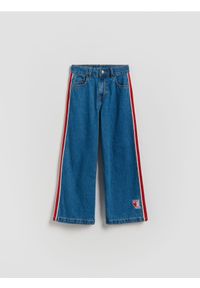 Reserved - Jeansy super wide leg z lampasami - niebieski. Kolor: niebieski